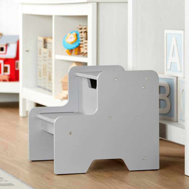 A playroom scene with The Melissa & Doug Kids Furniture Wooden Step Stool - Gray