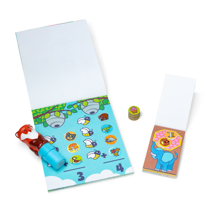 A kid playing with The Melissa & Doug Sticker WOW!™ Fox Bundle: 24-Page Activity Pad, Sticker Stamper, 500 Stickers, Arts and Crafts Fidget Toy Collectible Character