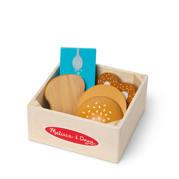 The loose pieces of The Melissa & Doug Wooden Food Groups Play Food Set – Grains