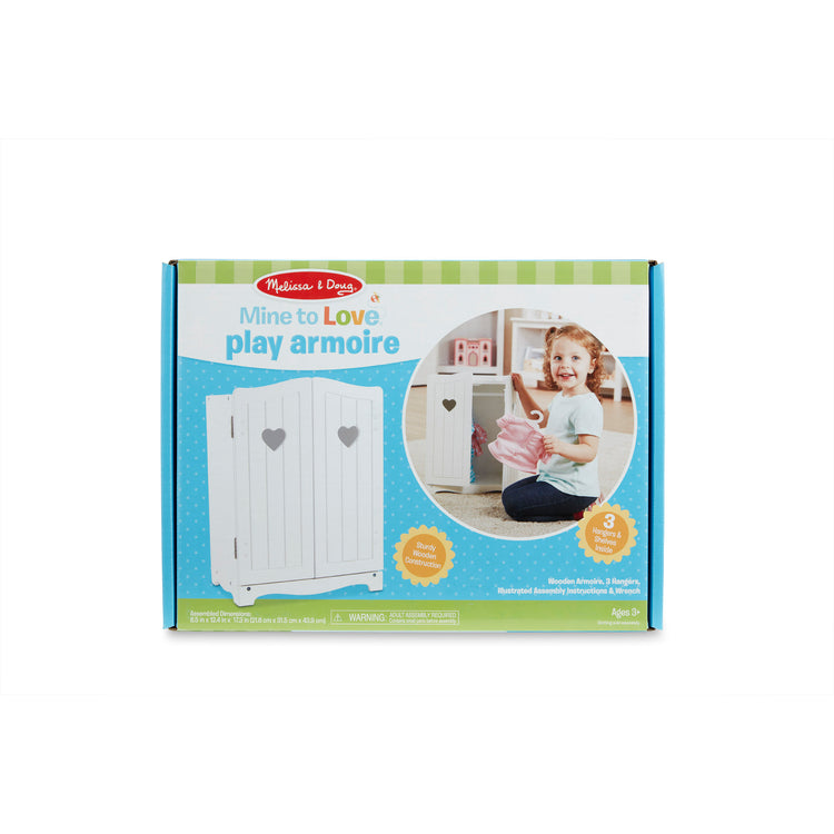 The front of the box for The Melissa & Doug Mine to Love Wooden Play Armoire Closet for Dolls, Stuffed Animals - White (17.3”H x 12.4”W x 8.5”D Assembled)