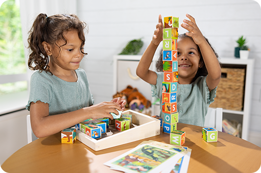 Kids playing with 24pc Parks ABC & Animal Cubes Puzzles