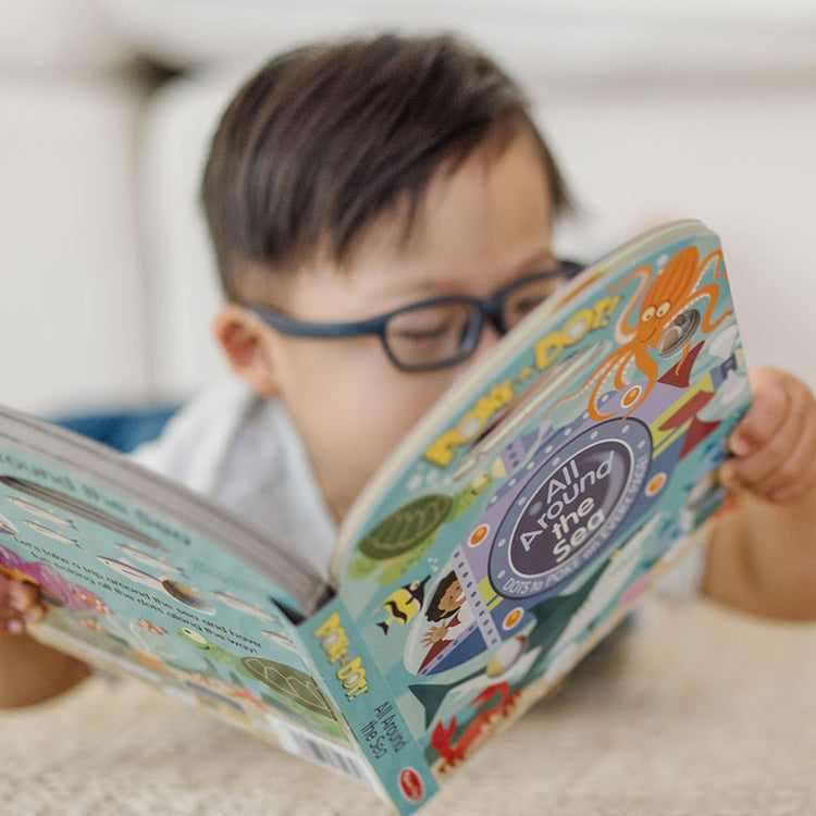 child reading book