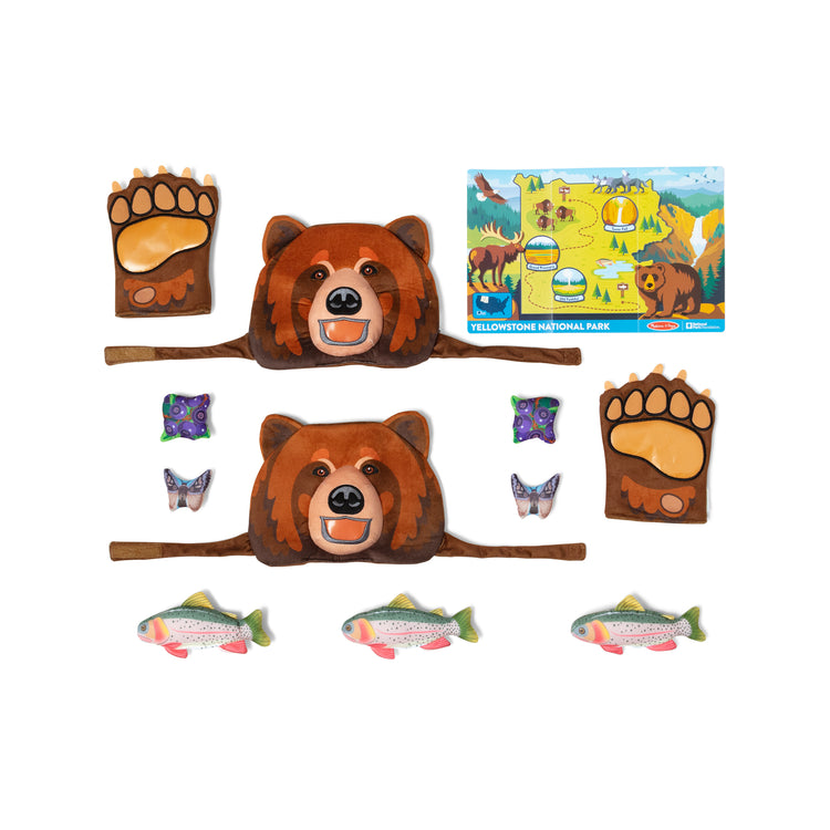 The loose pieces of The Melissa & Doug Yellowstone National Park Grizzly Bear Games and Pretend Play Set with Plush Bear Heads and Bear Paw Gloves