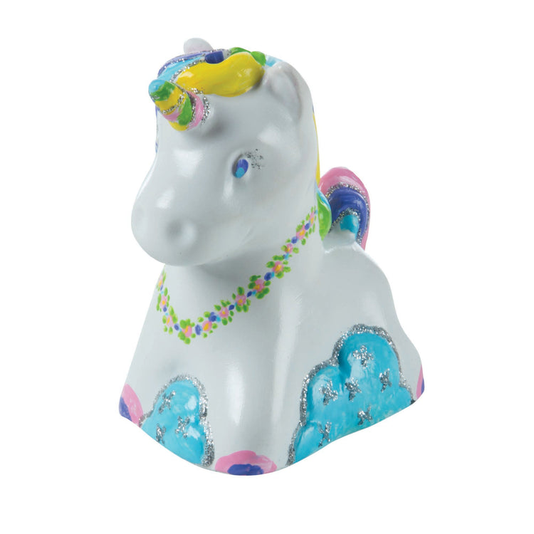 An assembled or decorated The Melissa & Doug Created by Me! Decorate-Your-Own Unicorn Bank Craft Kit With 6 Pots of Paint, Glitter Glue, Paintbrush