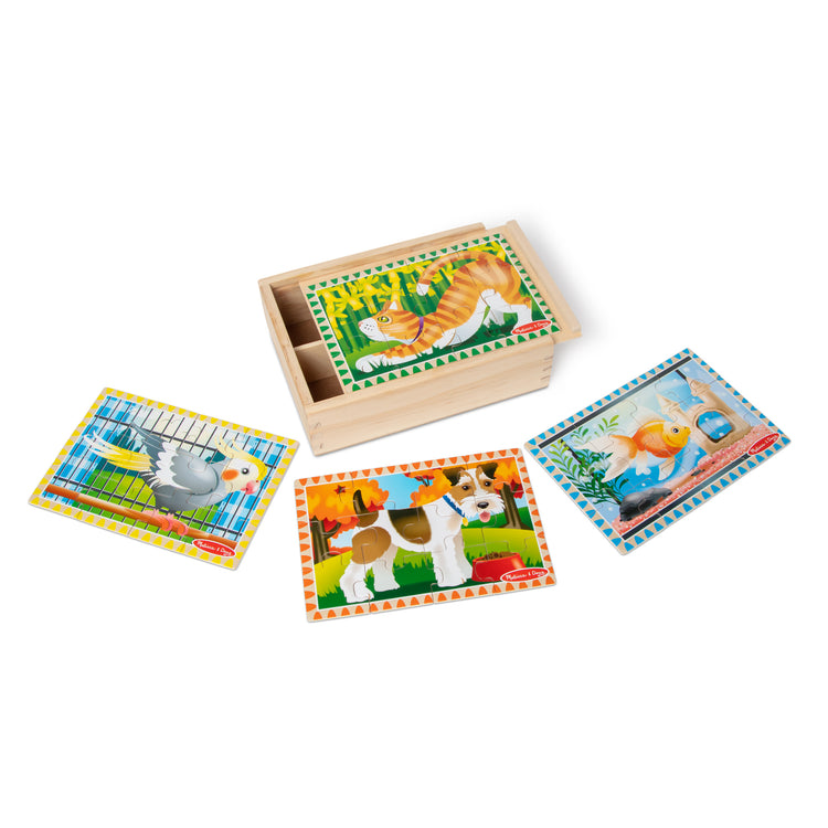 The loose pieces of The Melissa & Doug Wooden Jigsaw Puzzles in a Box 2-Pack for Preschool Boys and Girls – Pets, Vehicles