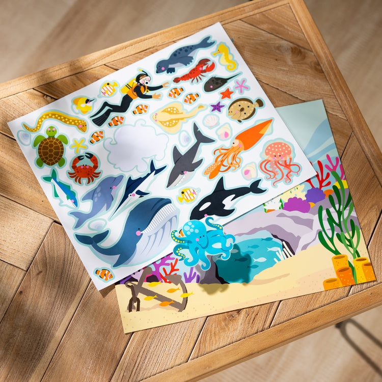 A playroom scene with The Melissa & Doug Reusable Sticker Pad: Habitats - 150+ Reusable Stickers