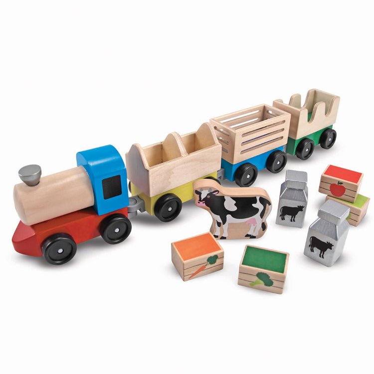 The loose pieces of The Melissa & Doug Wooden Farm Train Set - Classic Wooden Toy (3 linking cars)