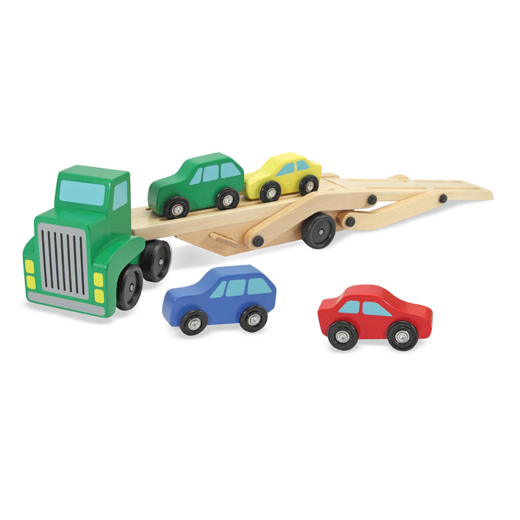 The loose pieces of The Melissa & Doug Car Carrier Truck and Cars Wooden Toy Set With 1 Truck and 4 Cars