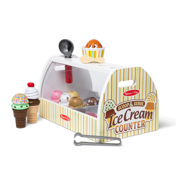 The loose pieces of The Melissa & Doug Wooden Scoop and Serve Ice Cream Counter (28 pcs) - Play Food and Accessories