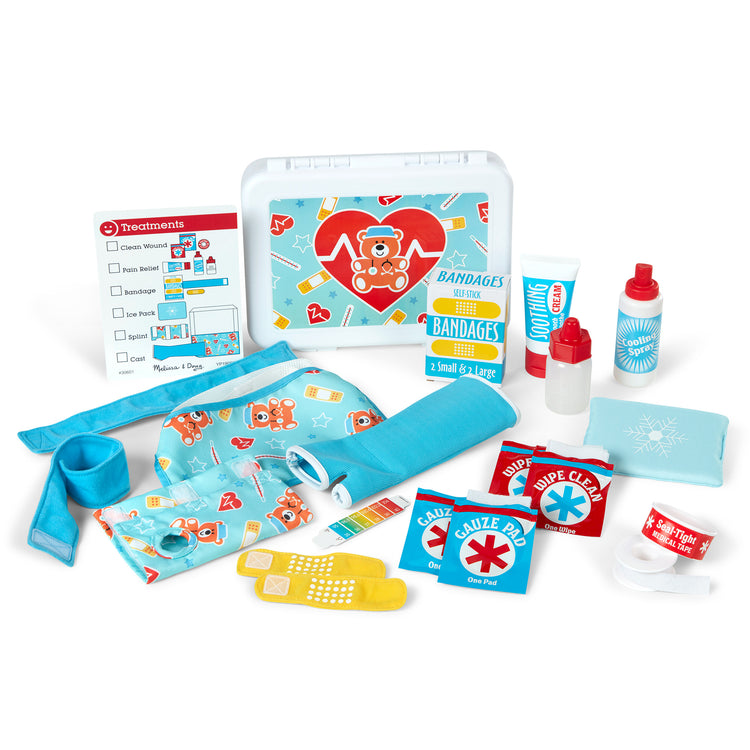 The loose pieces of The Melissa & Doug Get Well First Aid Kit Play Set – 25 Toy Pieces