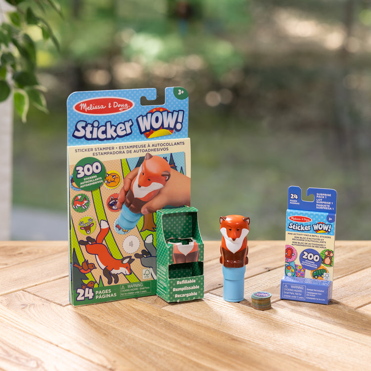 A playroom scene with The Melissa & Doug Sticker WOW!™ Fox Bundle: 24-Page Activity Pad, Sticker Stamper, 500 Stickers, Arts and Crafts Fidget Toy Collectible Character