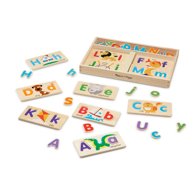 The loose pieces of The Melissa & Doug ABC Picture Boards - Educational Toy With 13 Double-Sided Wooden Boards and 52 Letters