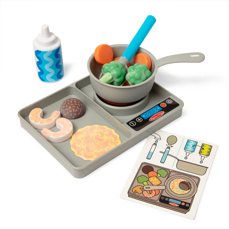 The loose pieces of The Melissa & Doug Simmer & Stir Stovetop Play Set with Water WOW!® Color Reveal Play Food Preschool Toy Ages 3+
