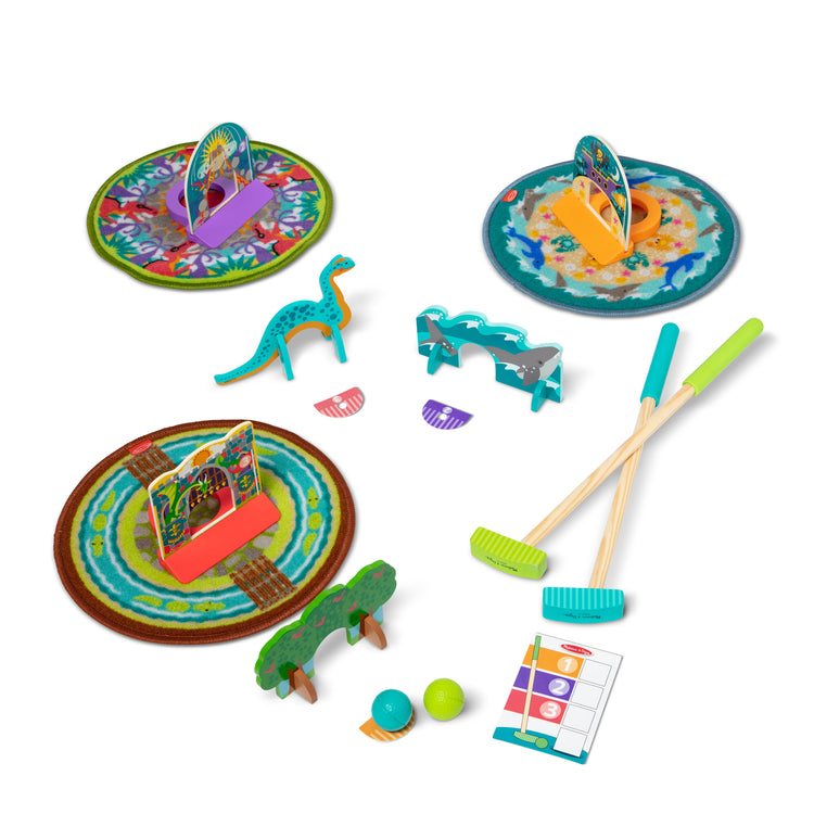 The loose pieces of The Melissa & Doug Fun at the Fair! Mini Golf Play Set – 3 Multi-Themed Holes and Wooden Obstacles