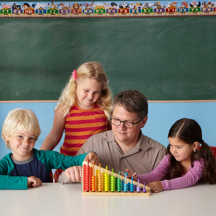 A kid playing with the Melissa & Doug Add & Subtract Abacus - Educational Toy With 55 Colorful Beads and Sturdy Wooden Construction