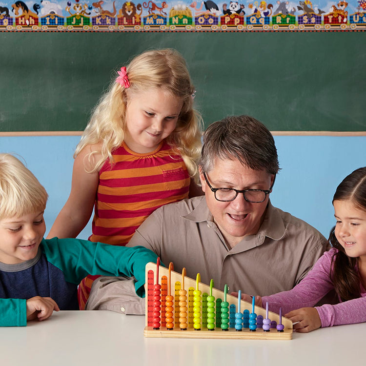 A kid playing with the Melissa & Doug Add & Subtract Abacus - Educational Toy With 55 Colorful Beads and Sturdy Wooden Construction