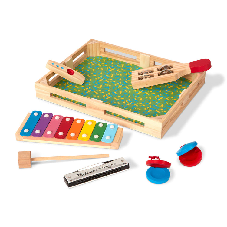 The loose pieces of the Melissa & Doug Band-in-a-Box Hum! Jangle! Shake! - 7-Piece Musical Instrument Set