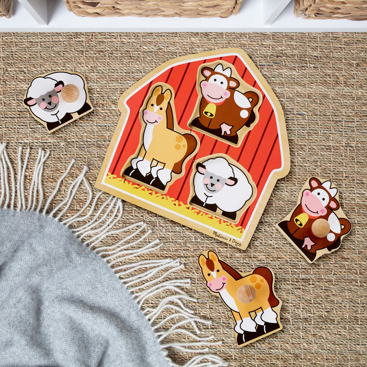 the Melissa & Doug Barnyard Animals Jumbo Knob Wooden Puzzle - Horse, Cow, and Sheep