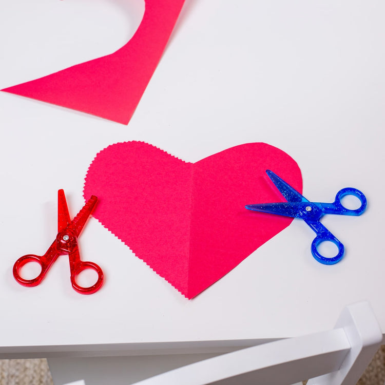 The front of the box for the Melissa & Doug Child-Safe Scissors - Child-Friendly Scissors, Lefty and Righty, Set of 2