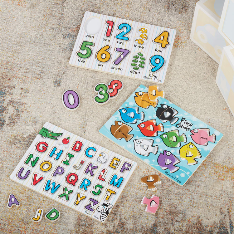 the Melissa & Doug Classic Wooden Peg Puzzles (Set of 3) - Numbers, Alphabet, and Colors