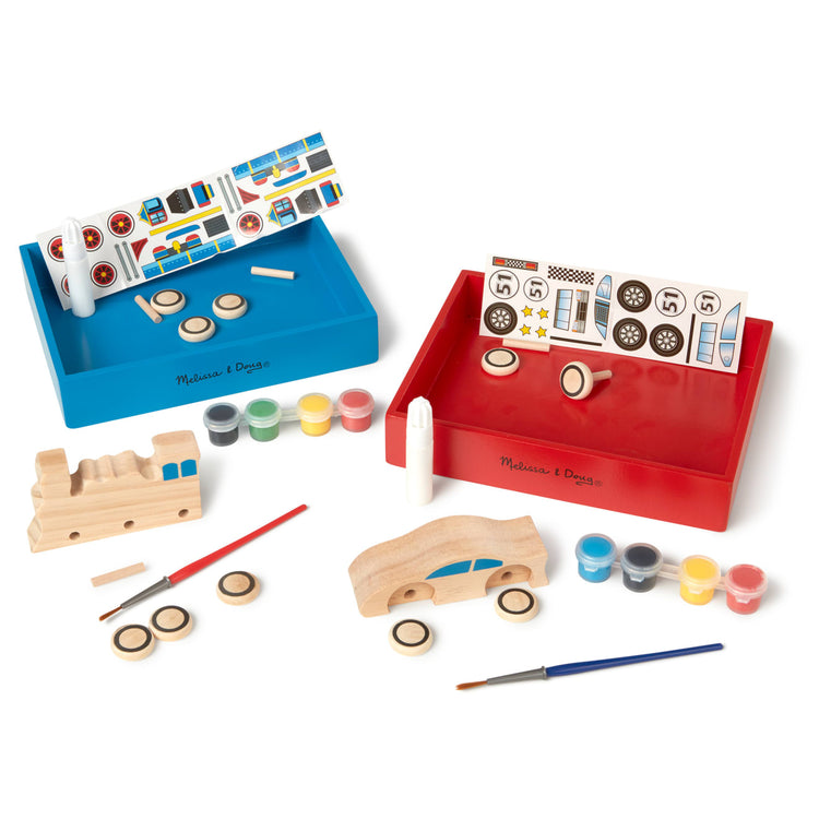 A kid playing with the Melissa & Doug Decorate-Your-Own Wooden Train and Race Car Craft Kits, Set of 2