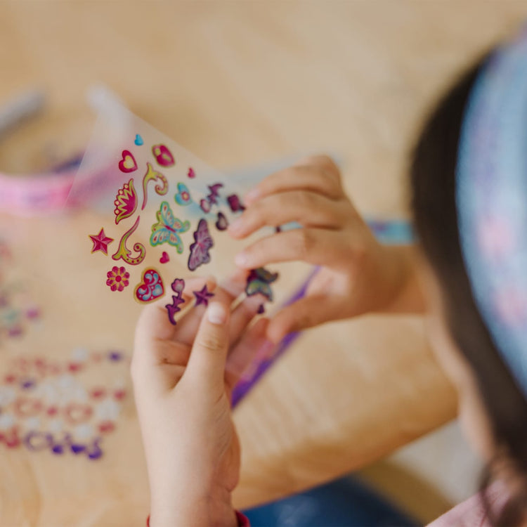 The front of the box for the Melissa & Doug Design-Your-Own Headbands Jewelry-Making Kit With 50+ Stickers