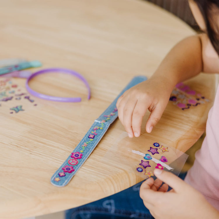 The front of the box for the Melissa & Doug Design-Your-Own Headbands Jewelry-Making Kit With 50+ Stickers