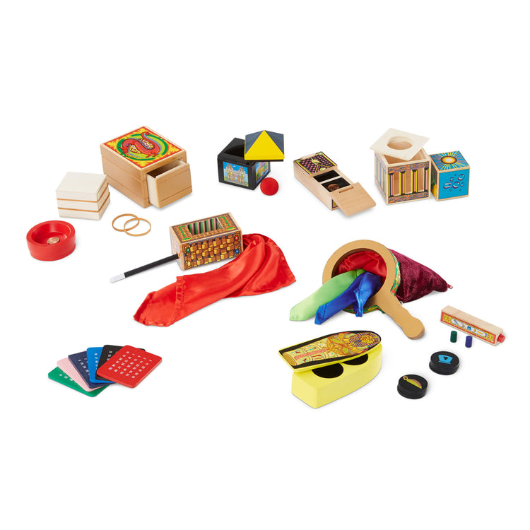 The loose pieces of the Melissa & Doug Deluxe Solid-Wood Magic Set With 10 Classic Tricks