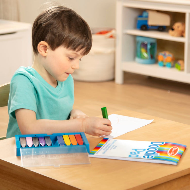 The front of the box for the Melissa & Doug Doodle Pad (6 x 9 inches) With 50 Sheets of White Bond Paper