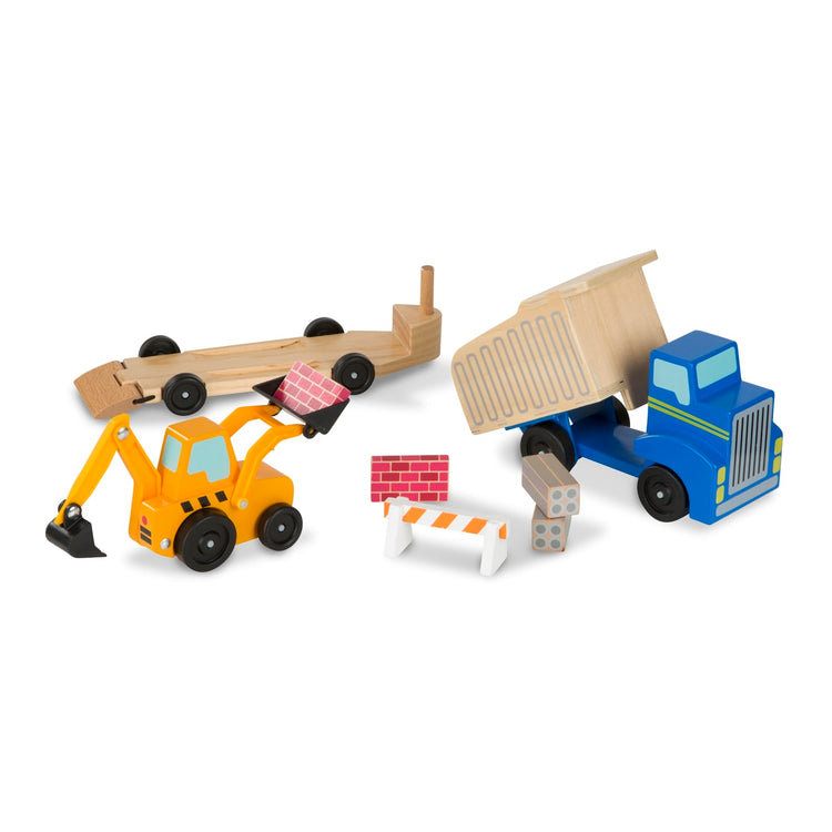 The loose pieces of the Melissa & Doug Classic Toy Wooden Dump Truck & Loader with Construction Pieces