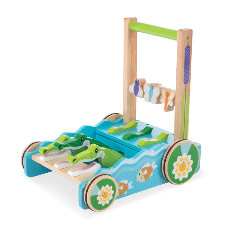 The loose pieces of the Melissa & Doug First Play Chomp and Clack Alligator Wooden Push Toy and Activity Walker