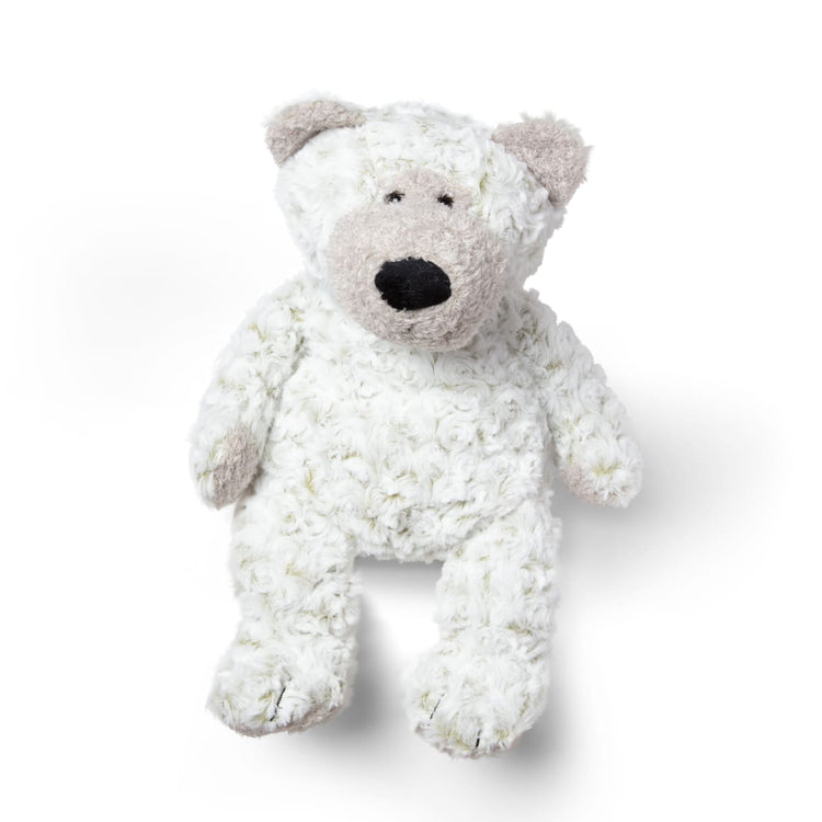 The loose pieces of the Melissa & Doug Greyson Bear Stuffed Animal