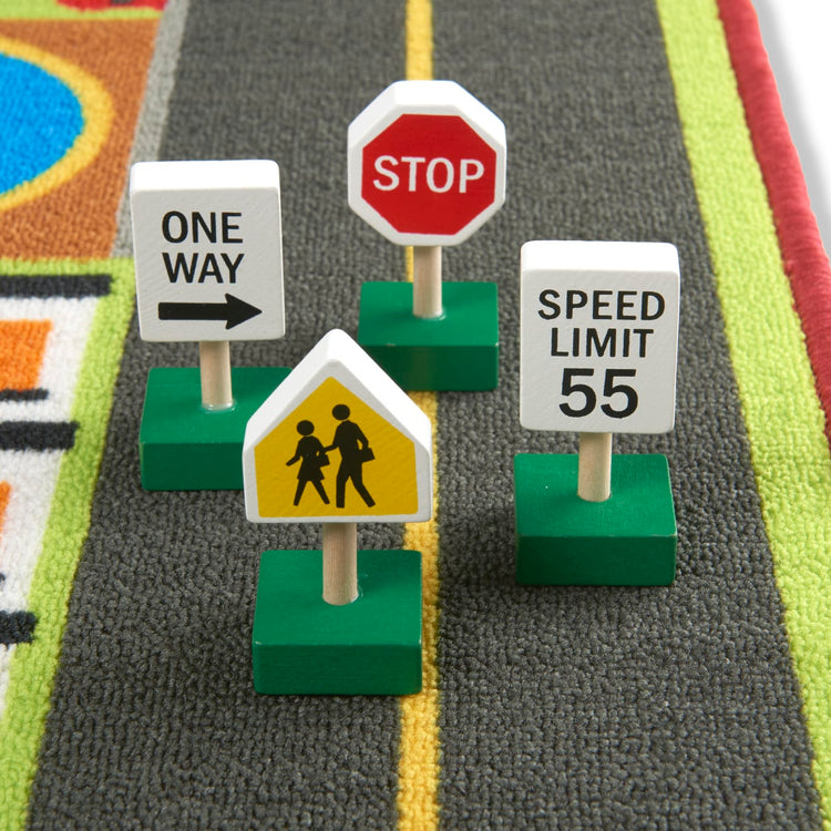 the Melissa & Doug Jumbo Roadway Activity Rug With 4 Wooden Traffic Signs (79 x 58 inches)