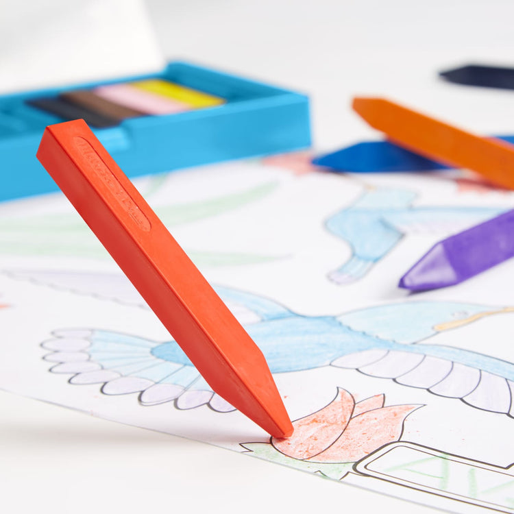 The front of the box for the Melissa & Doug Jumbo Triangular Crayons - 10-Pack, Non-Roll, Flip-Top Case