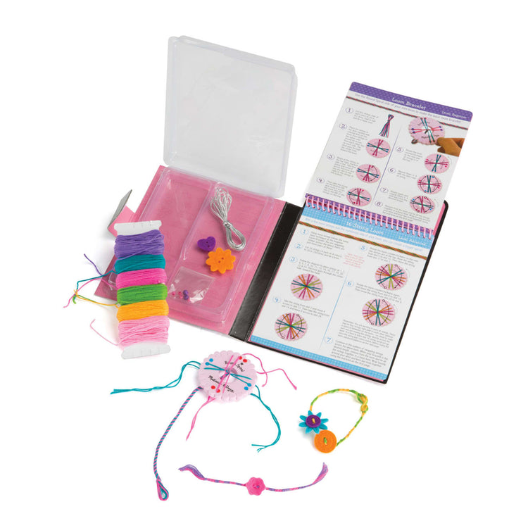 The loose pieces of the Melissa & Doug On the Go Friendship Bracelet Craft Set (Makes 10+ Bracelets)