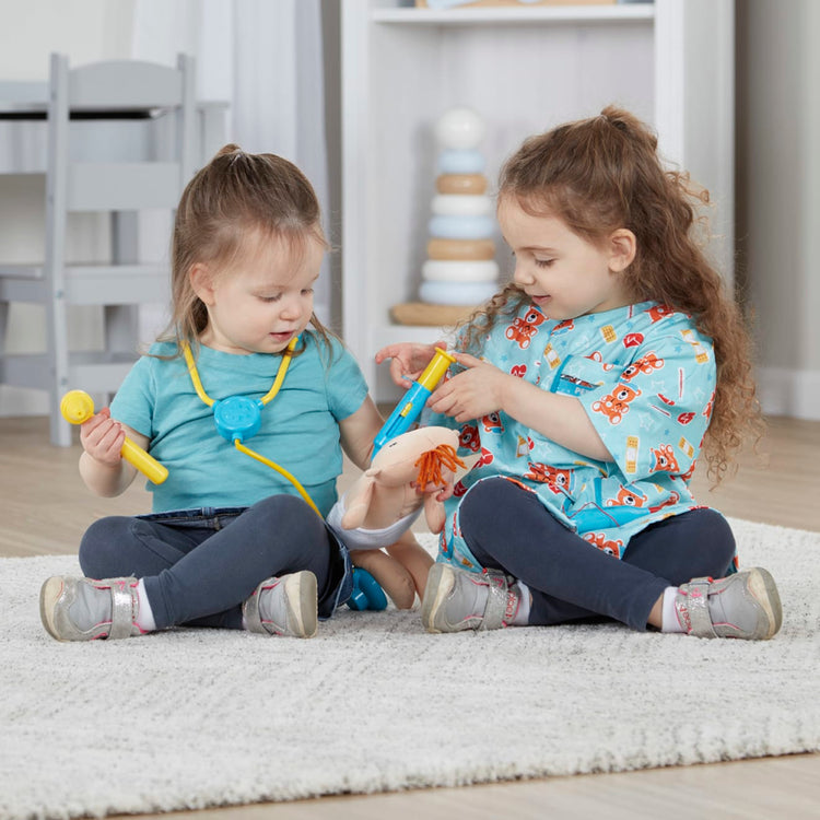 A kid playing with the Melissa & Doug Pediatric Nurse Costume Role Play Set (8 pcs) - Includes Baby Doll, Stethoscope