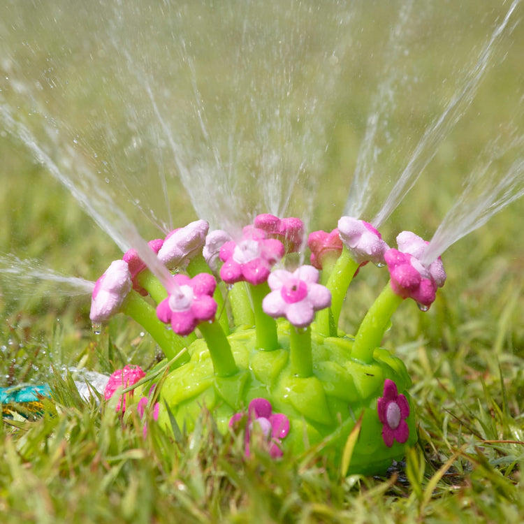 the Melissa & Doug Sunny Patch Pretty Petals Flower Sprinkler Toy With Hose Attachment