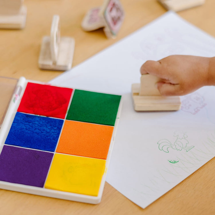 The front of the box for the Melissa & Doug Rainbow Stamp Pad - 6 Washable Inks