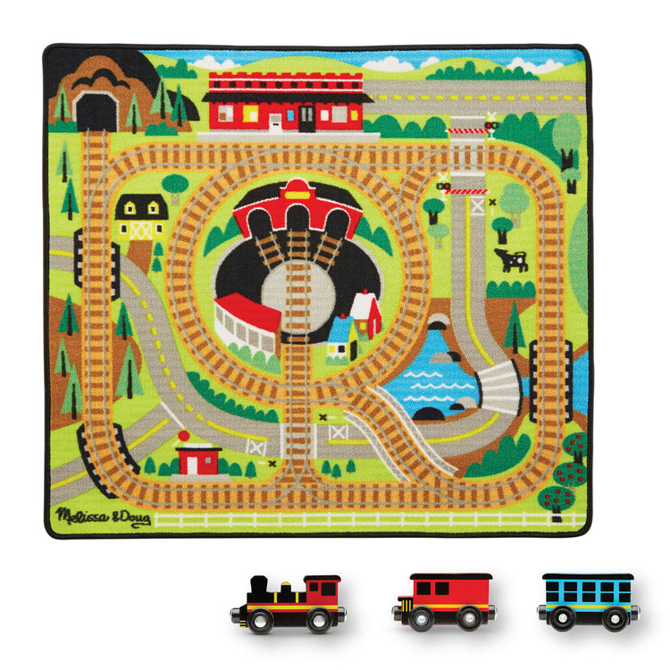 The loose pieces of the Melissa & Doug Round the Rails Train Rug With 3 Linking Wooden Train Cars  (39 x 36 inches)