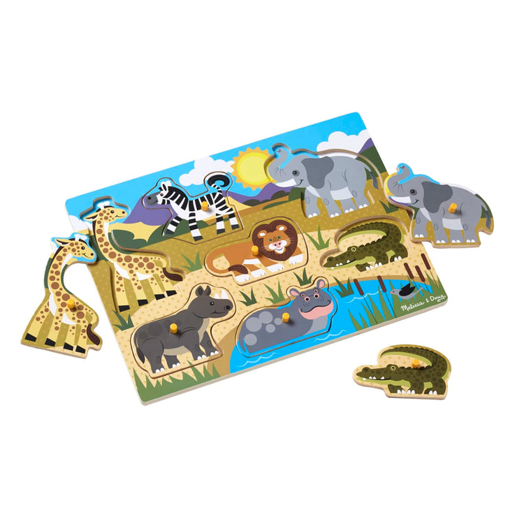 The loose pieces of the Melissa & Doug Safari Wooden Peg Puzzle (7 pcs)