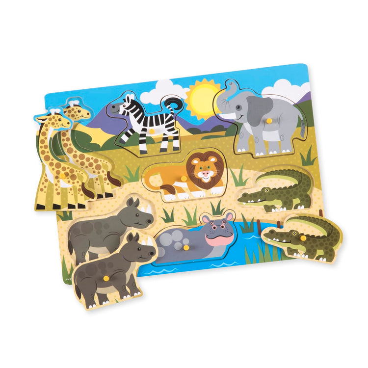 The loose pieces of the Melissa & Doug Safari Wooden Peg Puzzle (7 pcs)