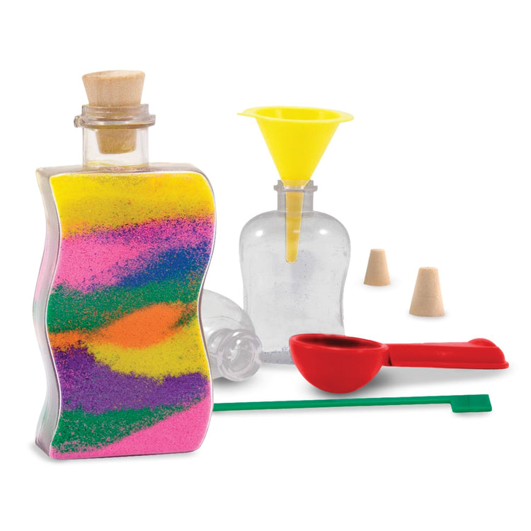 The front of the box for the Melissa & Doug Created by Me! Sand Art Bottles Craft Kit: 3 Bottles, 6 Bags of Colored Sand, Design Tool