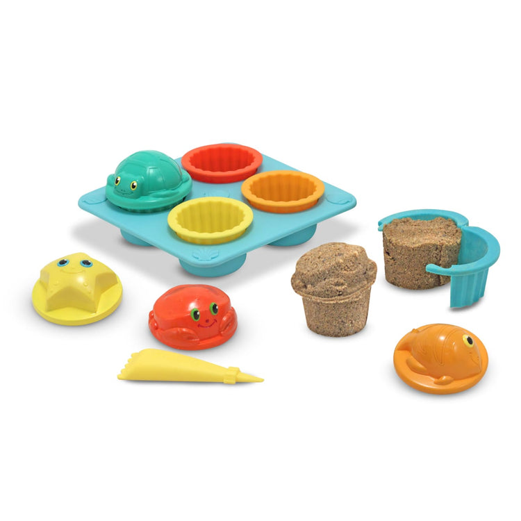 The loose pieces of the Melissa & Doug Sunny Patch Seaside Sidekicks Sand Cupcake Play Set