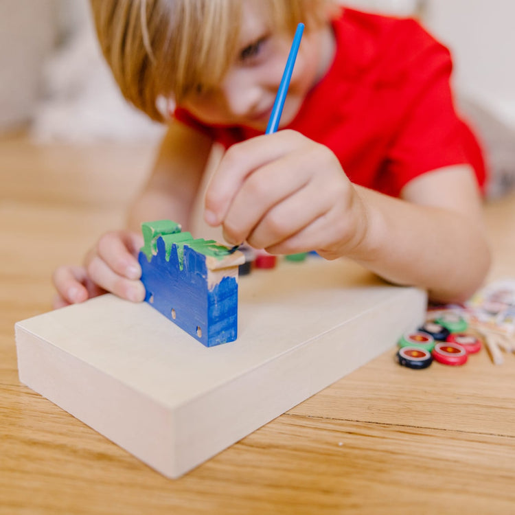 The front of the box for the Melissa & Doug Train Wooden Craft Kit