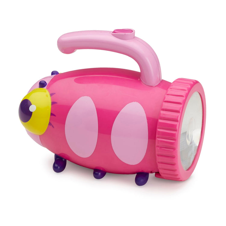 The loose pieces of the Melissa & Doug Sunny Patch Trixie Ladybug Flashlight With Easy-Grip Handle