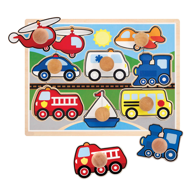 The loose pieces of the Melissa & Doug Vehicles Jumbo Knob Wooden Puzzle (8 pcs)