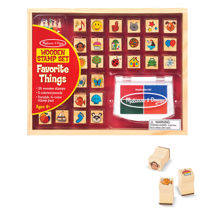 The loose pieces of the Melissa & Doug Wooden Stamp Set, Favorite Things - 26 Wooden Stamps, 4-Color Stamp Pad