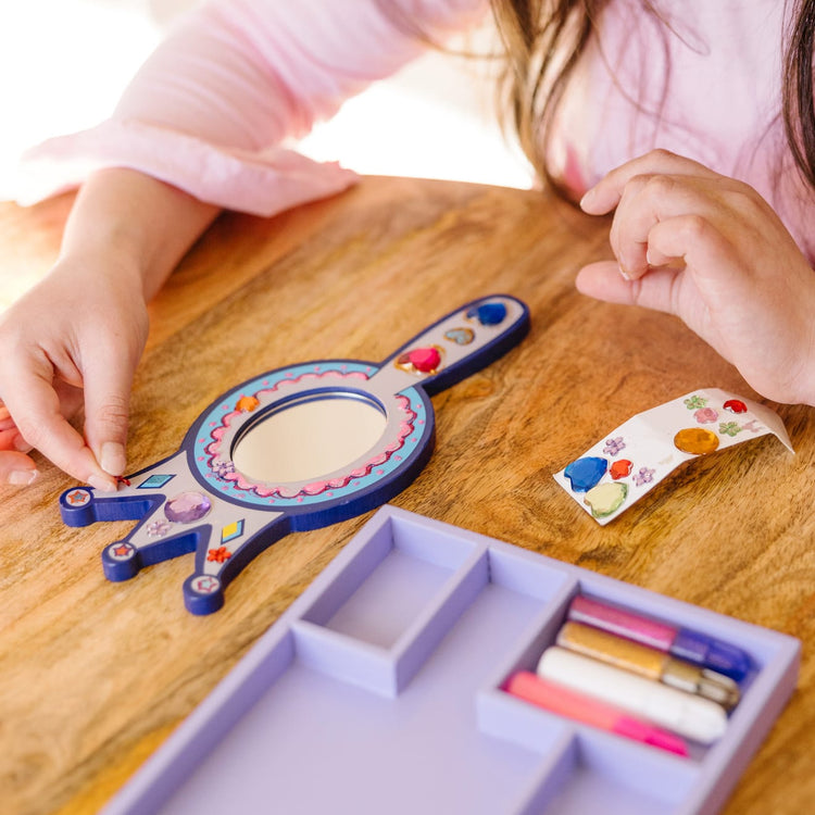 The front of the box for the Melissa & Doug Decorate-Your-Own Wooden Princess Mirror Craft Kit