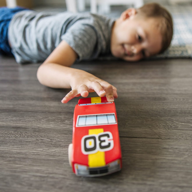 The front of the box for the Melissa & Doug Decorate-Your-Own Wooden Race Car Craft Kit